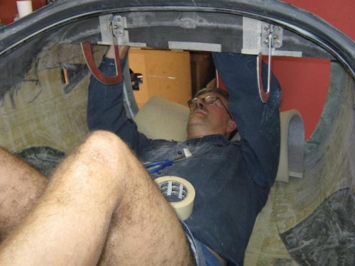 Fixing hinges to fuse frame.