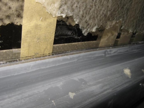 Trimming the outside skin back to near the inside canopy frame line.