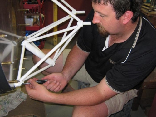 Rodney tightening temp nut to hold mount