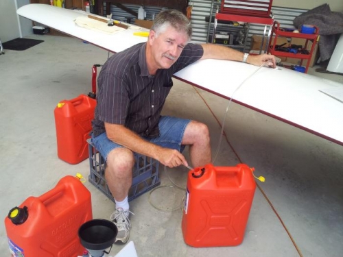 Draining the fuel right tank - so the left tank  could be calibrated.