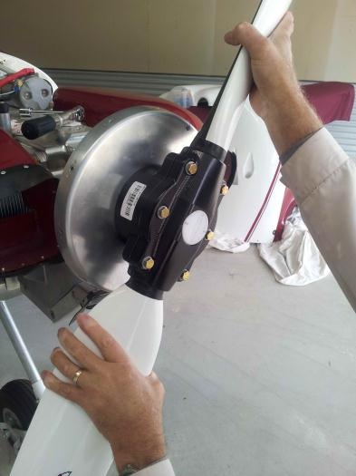 Reading the scale on the centre white hub and twisting the blades to about the right pitch ...