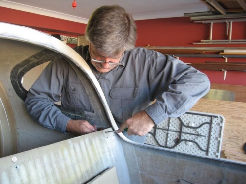 Removing and moving the seatback brace.