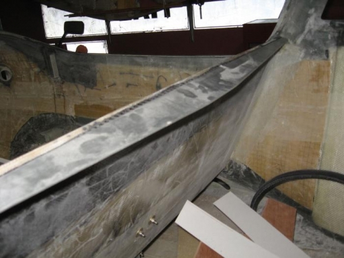 Brace relocated to the top of the seatback.