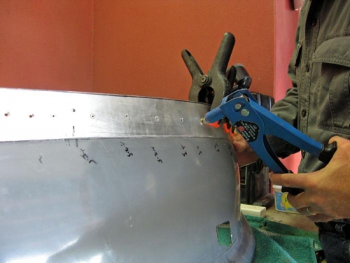 Riveting the shiled to the supports