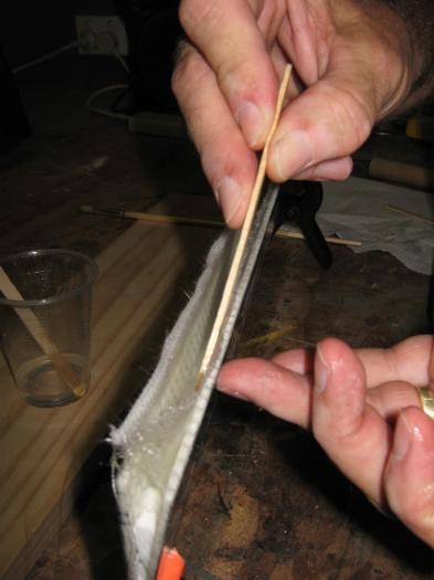 Fitting the glass sheet into the trim tab
