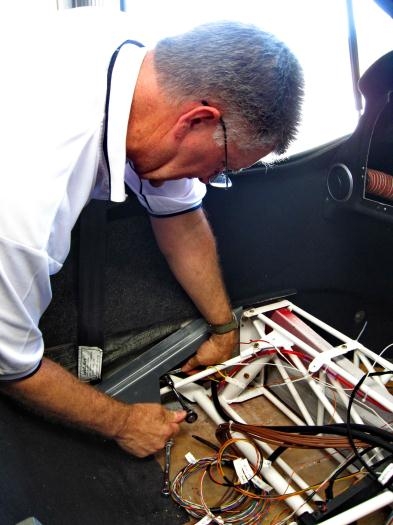 Fitting and adjusting the flap push rods.