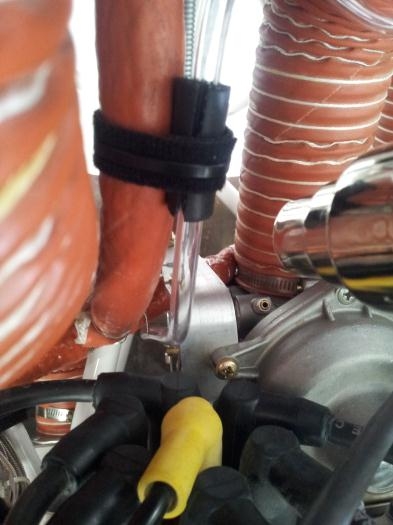 Heat shrink on the carbo bowl breather nipple.