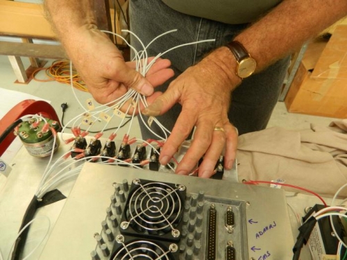 Bringing the positive cables together.