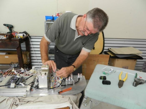 Cutting and stripping each cable.