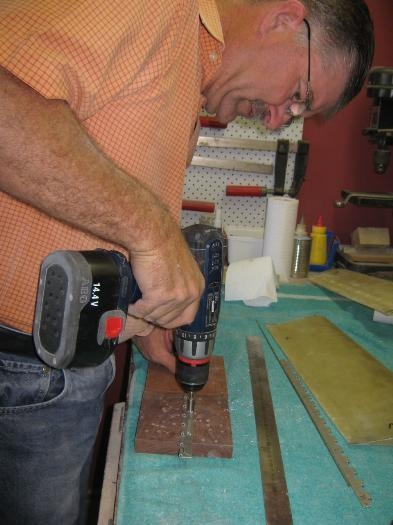 Drilling hinge leaves.