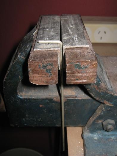 Cutting and bending hinge pins.