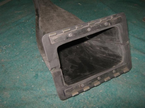 Hinge leaves riveted to the NACA duct.