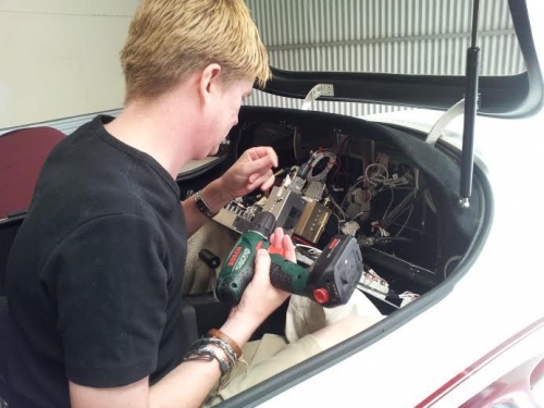 Robert replacing one of the panel nut plates.