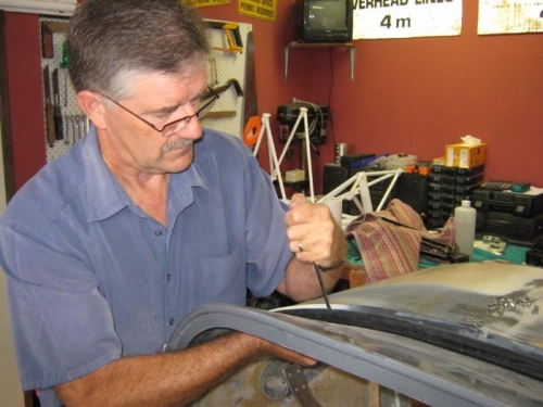 Panel back in again - followed by the gas struts.