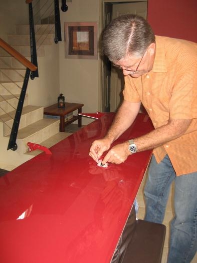 Removing masking tape from the wings