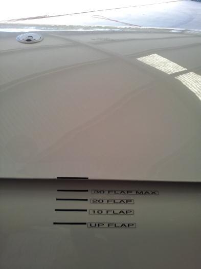 Direct flap marking on LH flap.