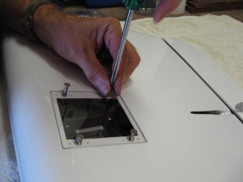 Fixing the clear acrylic inspection cover.