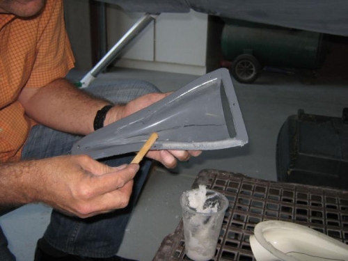 Applying the flock to the ducts.