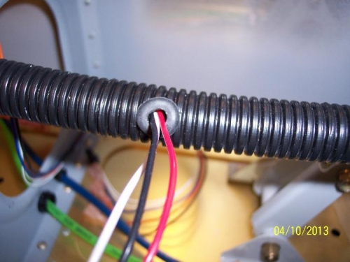 Grommet for wires into duct