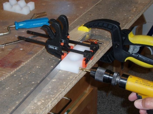 Clamp and drill on bench