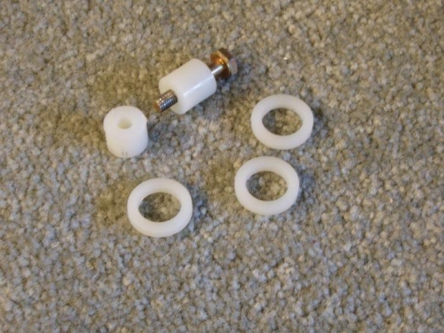 1/2 in nylon bushing and 3/4 in washers