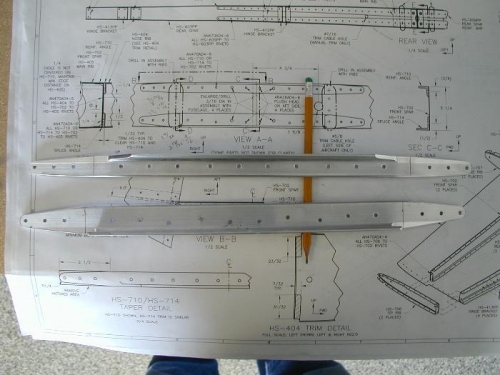 Tapered front spar supports