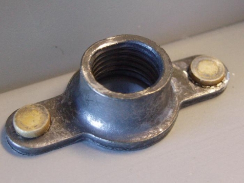 Close up of plate nut