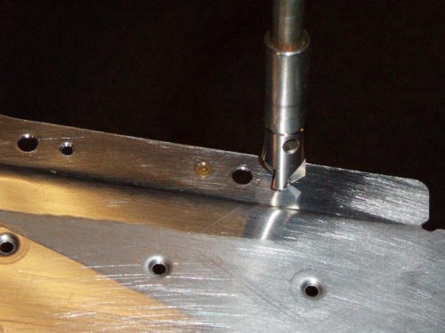 Countersink rivet holes with debur bit