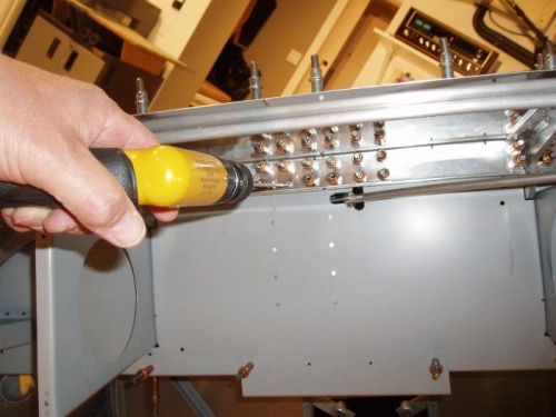 Enlarge splice plate holes to 1/8
