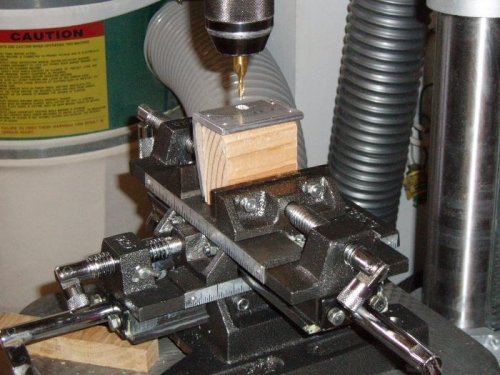Drill press and sliding table with end mill