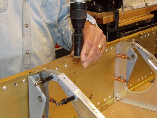 Countersink the rivet holes