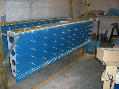 Left wing top skins installed