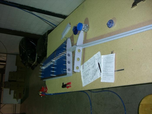 Riveting the left skin to front spar