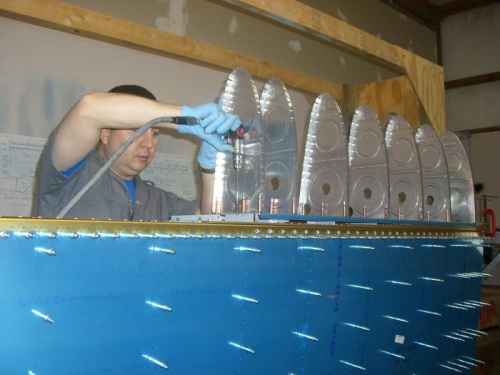 Drilled ribs to baffle and attach brackets