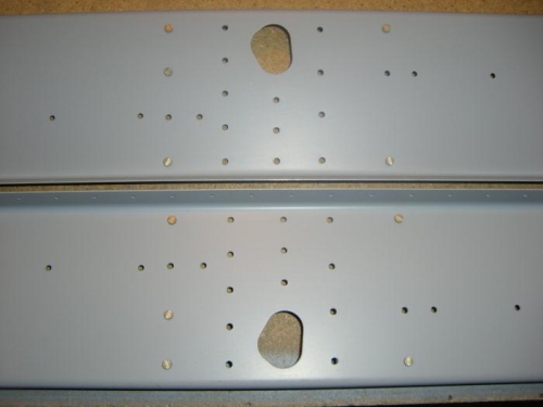 Doubler plates riveted to rear spar