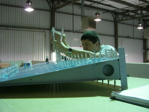 riveting the skins to the spar.