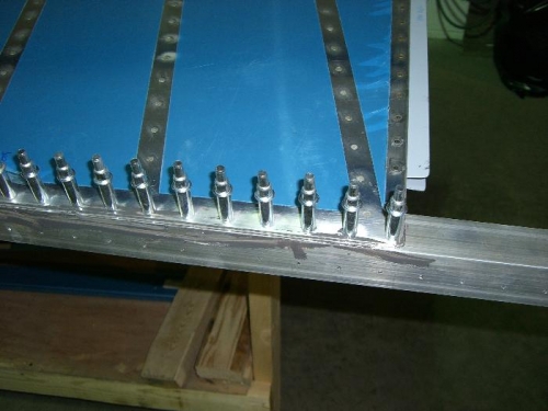 Trailing edge bonded with angle to keep straight.