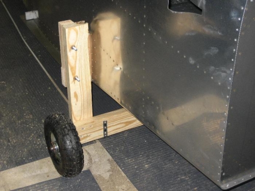 Vertical 2x4 bolted to the plywood that runs into the wing spar slot