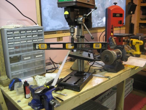 The base of the drill press is set at an amgle to match the wedge