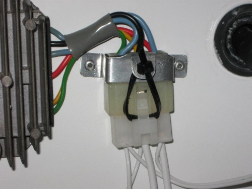 zip tie holds the plug in the bracket to aid keeping the wiring tidy
