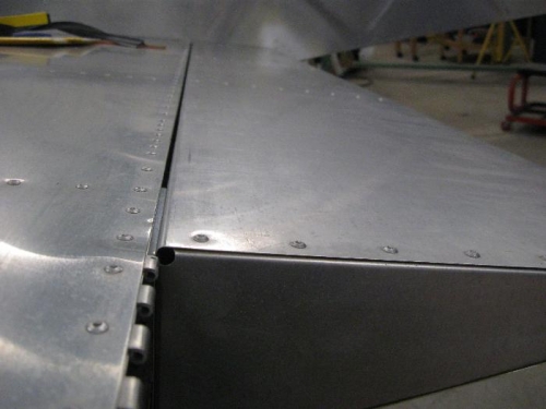 Flaps are tensioned against the flap gap stops