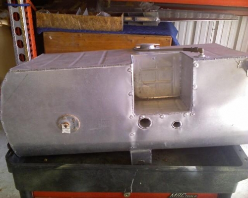 25 gal header tank which will be located forward of instrument panel.