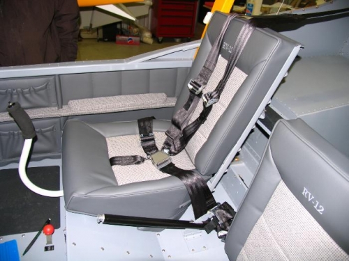 Side panel and right seat installed.