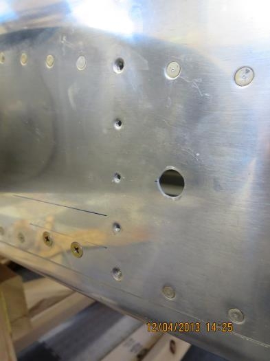 Five Rivets Drilled Out