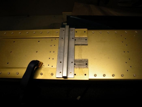 Fabricated spacers and tie down assembly.