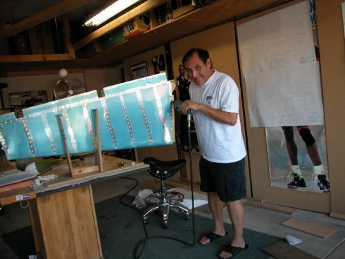 Using the rivet squezzer to rivet the lower portion of the rudder