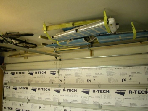 I put the long aluminium and long wing oarts on a shelf the length of the garage.