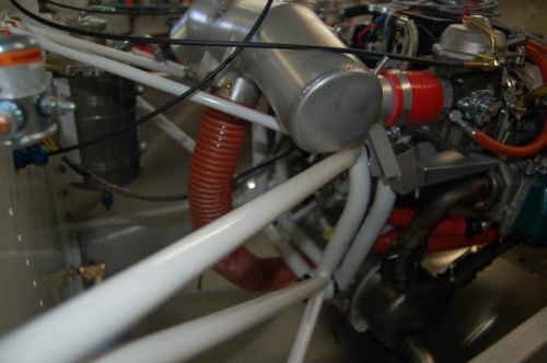 airbox with longer connecting tubes (in red) .  Drainage tube still to close to the engine mount