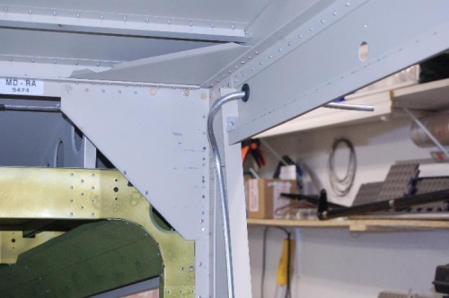 curved exit to fuel tank
