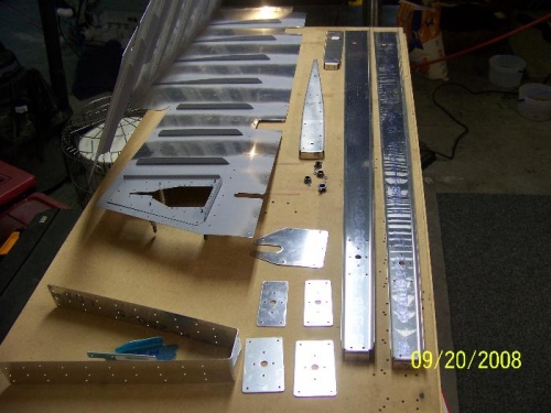 Elevator spars and reinforcement plates